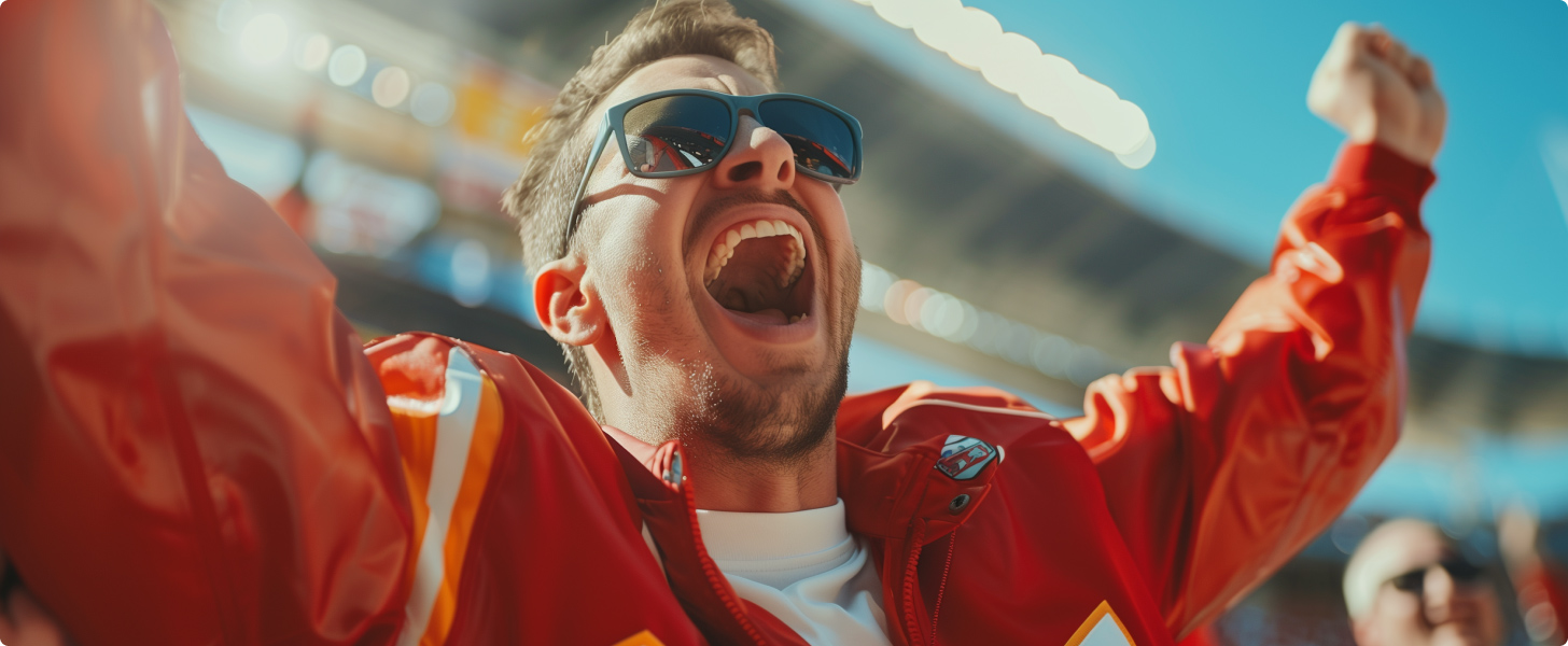 Man cheering for favorite football team